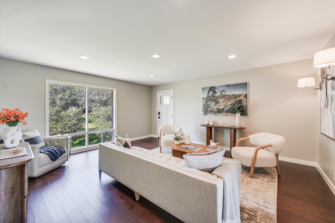 5332 Balcones Drive, Unit I Austin, TX 78731 - Photo 2 of 16 a living room with furniture and a large window