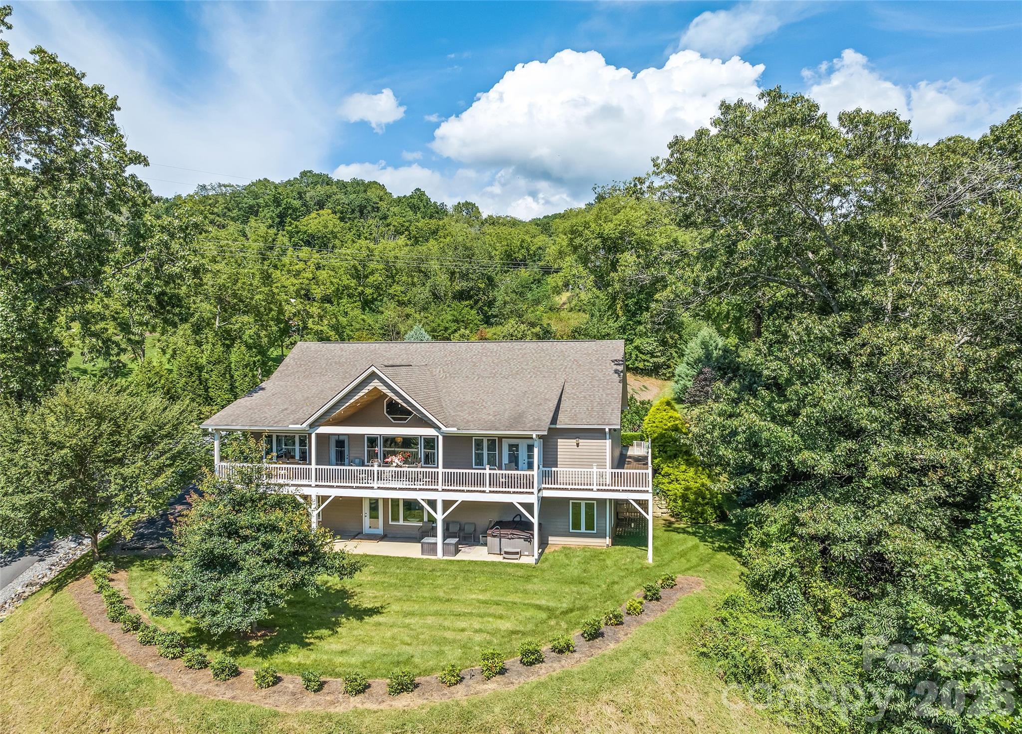 140 Debbie Loop Waynesville, NC 28786 - Photo 1 of 47 an aerial view of a house
