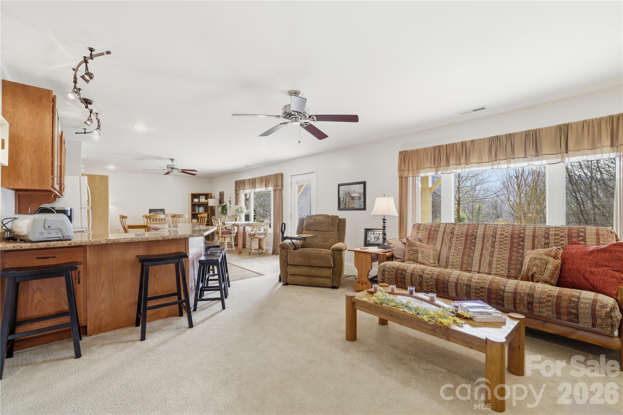 140 Debbie Loop Waynesville, NC 28786 - Photo 32 of 47 a living room with furniture and a large window