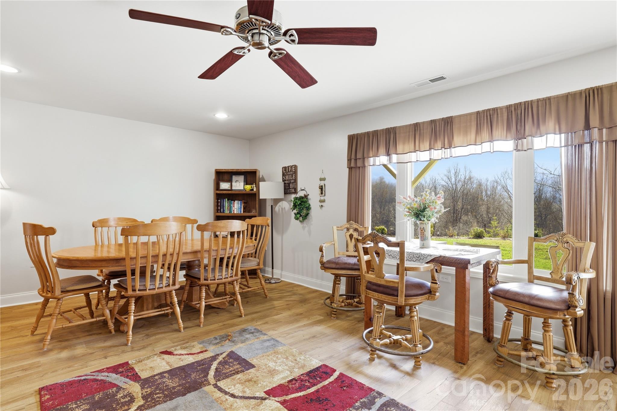 140 Debbie Loop Waynesville, NC 28786 - Photo 34 of 47 a view of a dining room with furniture window and outside view