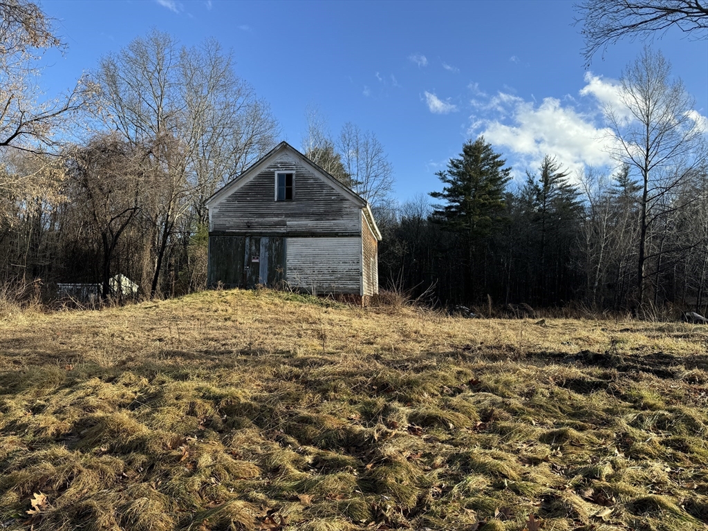37 True Road Salisbury, MA 01952 - Photo 5 of 28 a front view of a house with a yard