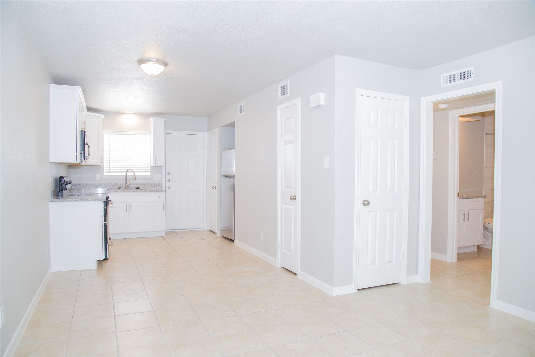 2010 North Travis Street, Unit 116 Liberty, TX 77575 - Photo 11 of 11 a view of a kitchen with a sink