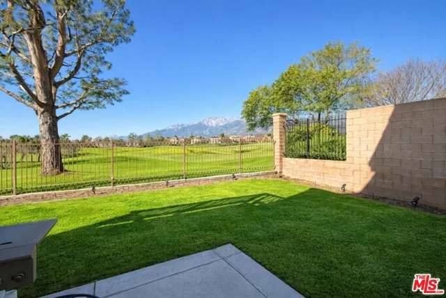 a view of a golf course with a garden