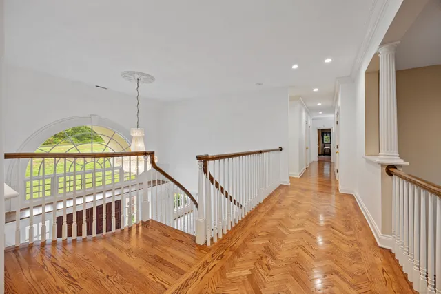 a view of entryway with wooden floor