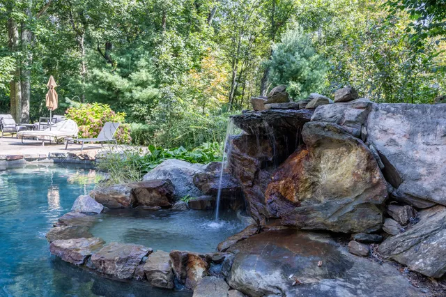a view of a water with a fire pit