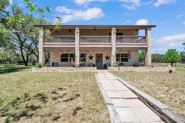 a front view of a building with street view