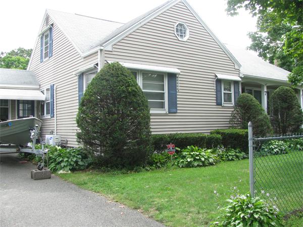 7 Eddy Street Springfield, MA 01104 - Photo 3 of 25 a front view of a house with a garden