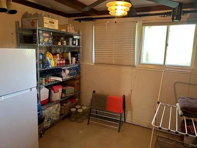 a view of backyard with green space