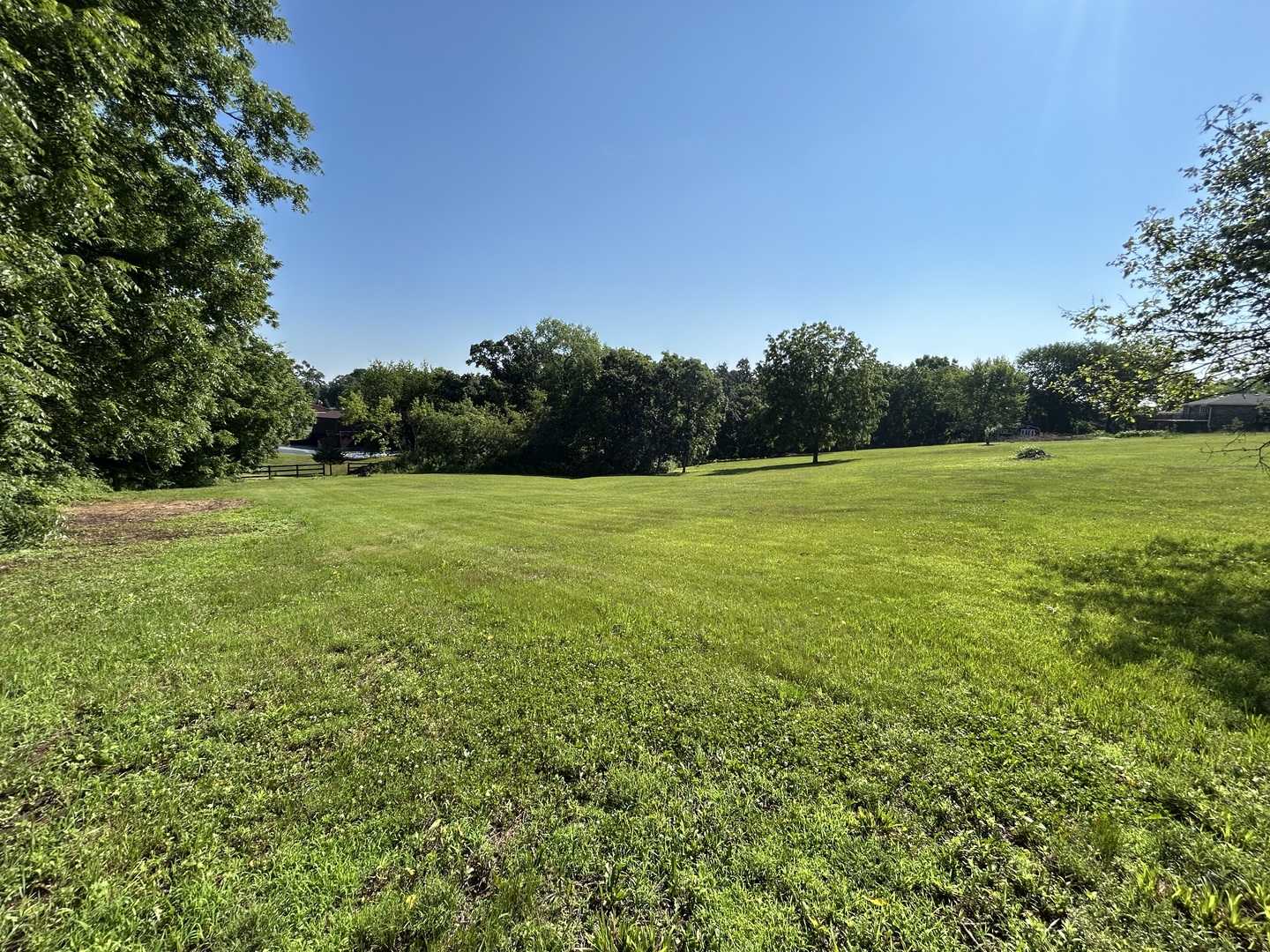 194 South Collins Street South Elgin, IL 60177 - Photo 36 of 48 a view of a field with trees in the background