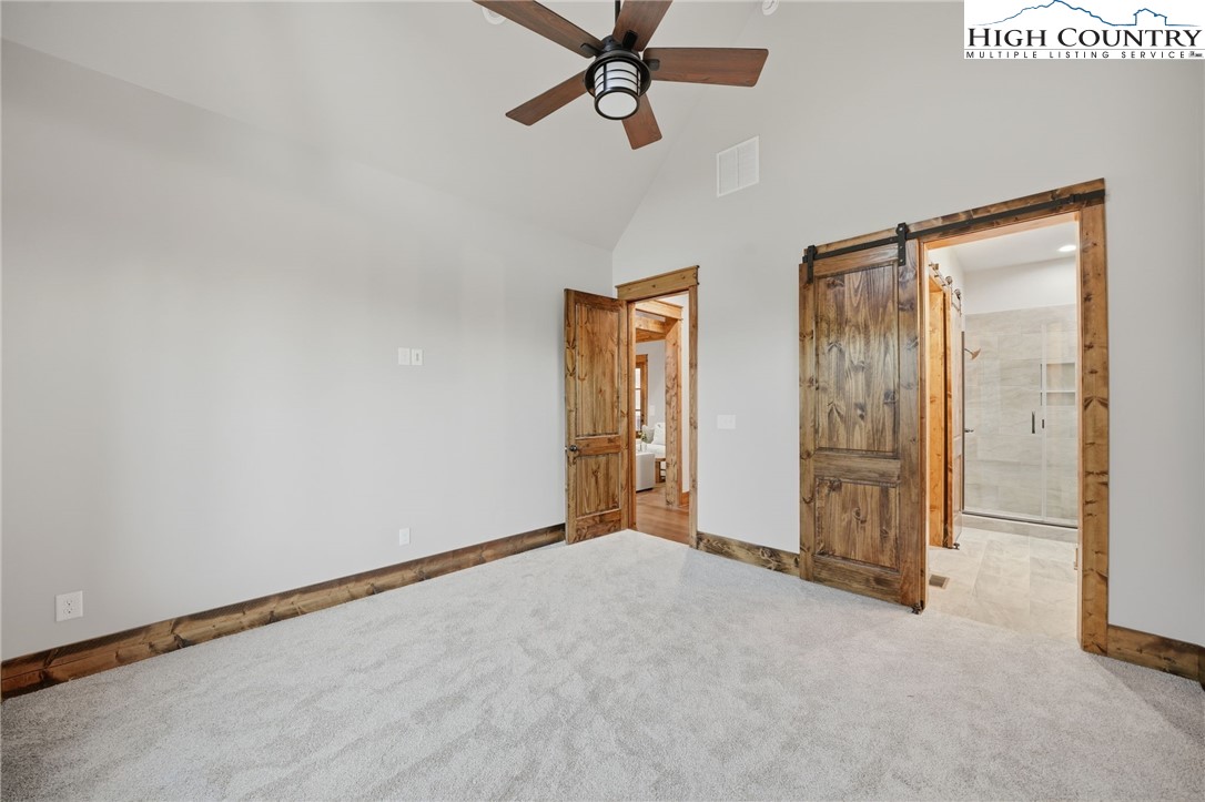 123 High Country Overlook Overlook, Unit OVERLOOK Banner Elk, NC 28604 - Photo 26 of 48 a view of empty room with ceiling fan