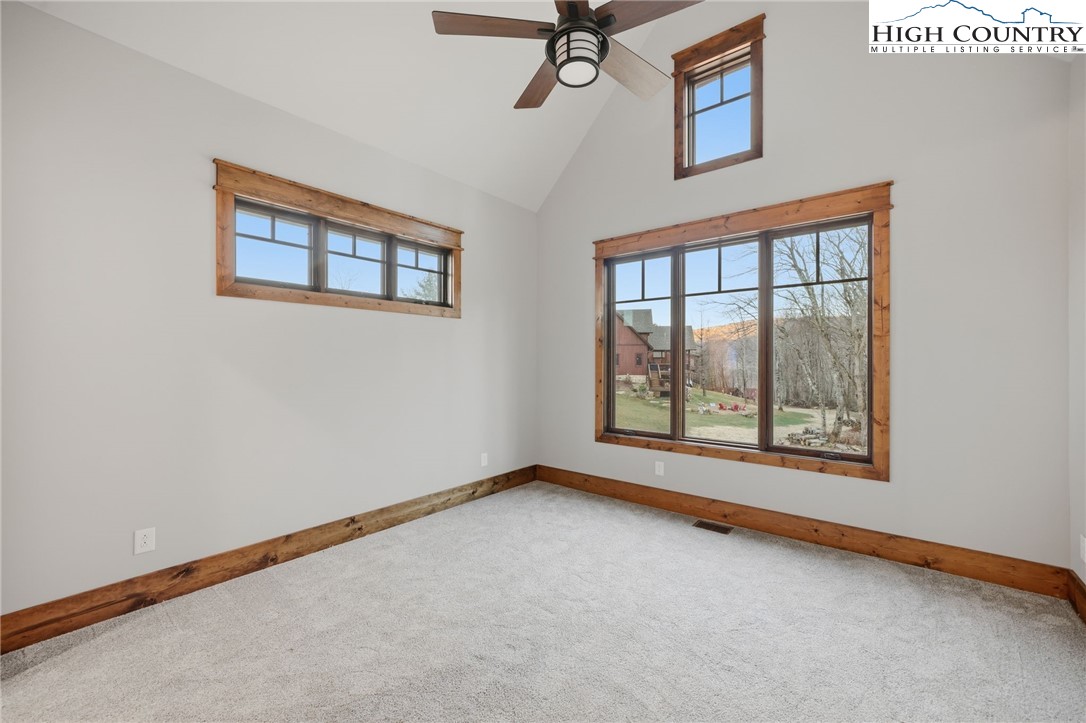 123 High Country Overlook Overlook, Unit OVERLOOK Banner Elk, NC 28604 - Photo 27 of 48 a view of an empty room with a window