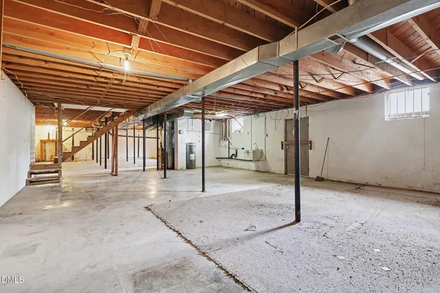 a view of a room with wooden walls