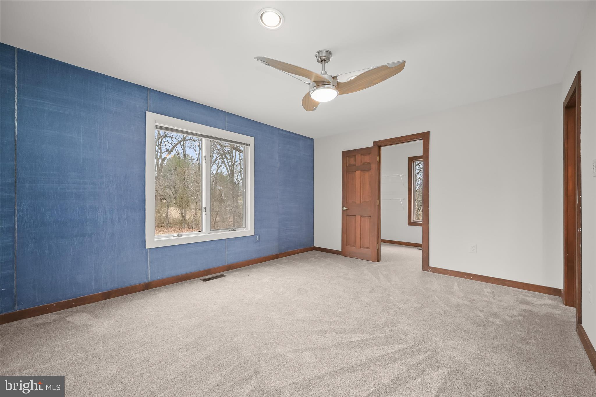 13304 Ridgewood Drive Ellicott City, MD 21042 - Photo 46 of 95 a view of an empty room with a window