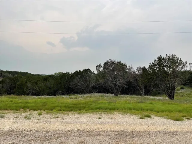 a view of a field with beach