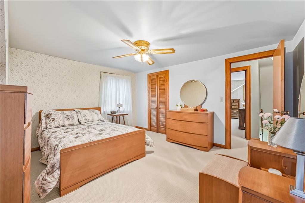 393 South 7th Street Sharpsville, PA 16150 - Photo 32 of 50 a bedroom with a bed and a dresser