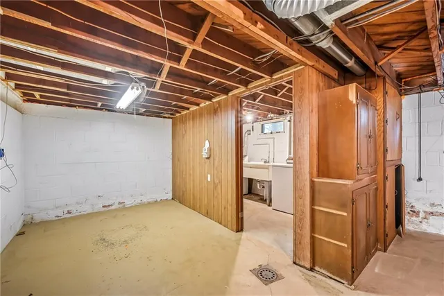 a view of a room with wooden walls