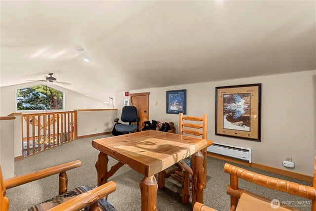 a view of a livingroom with furniture and window