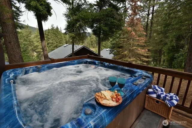 a view of a backyard with sitting area