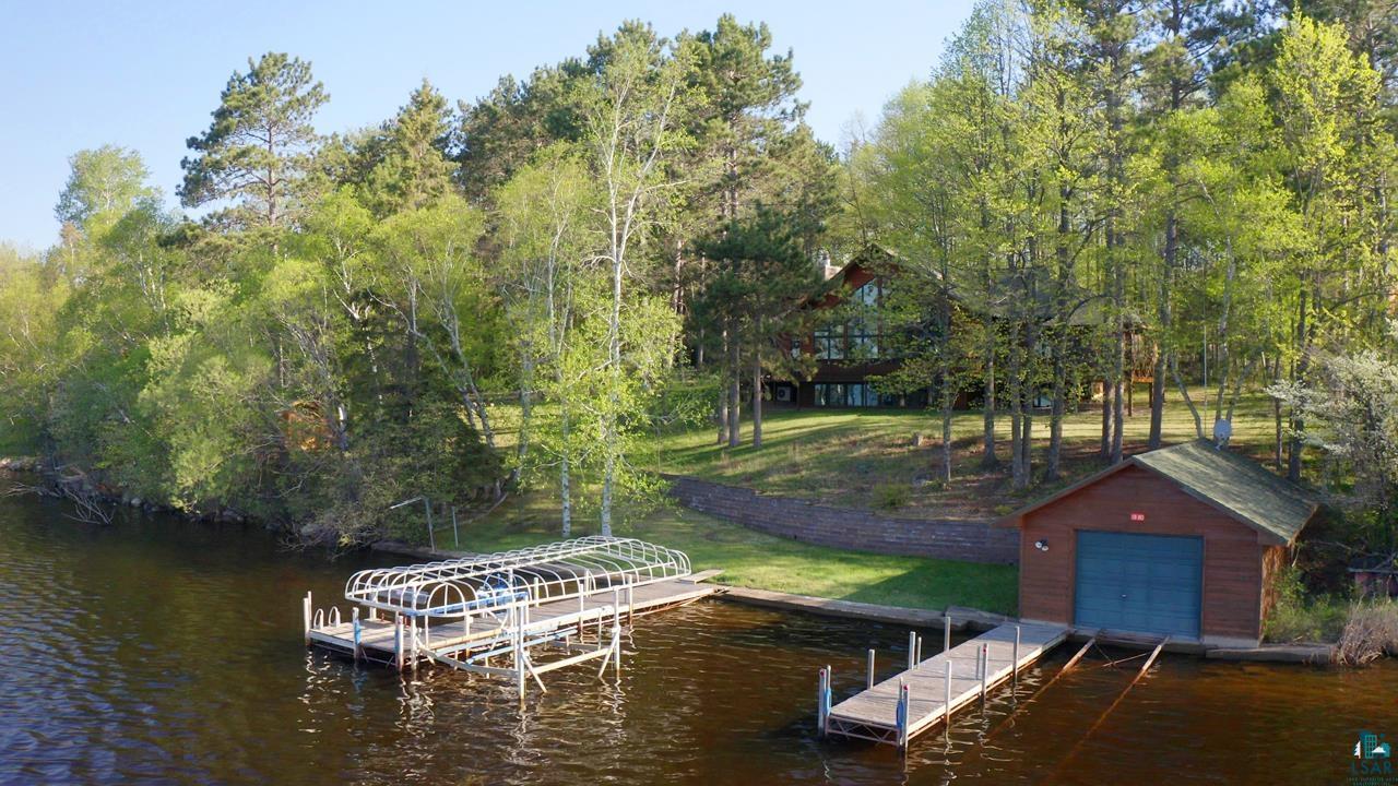 1880 Everett Bay Road Tower, MN 55790 - Photo 2 of 50 Dock featuring a water view and a lawn