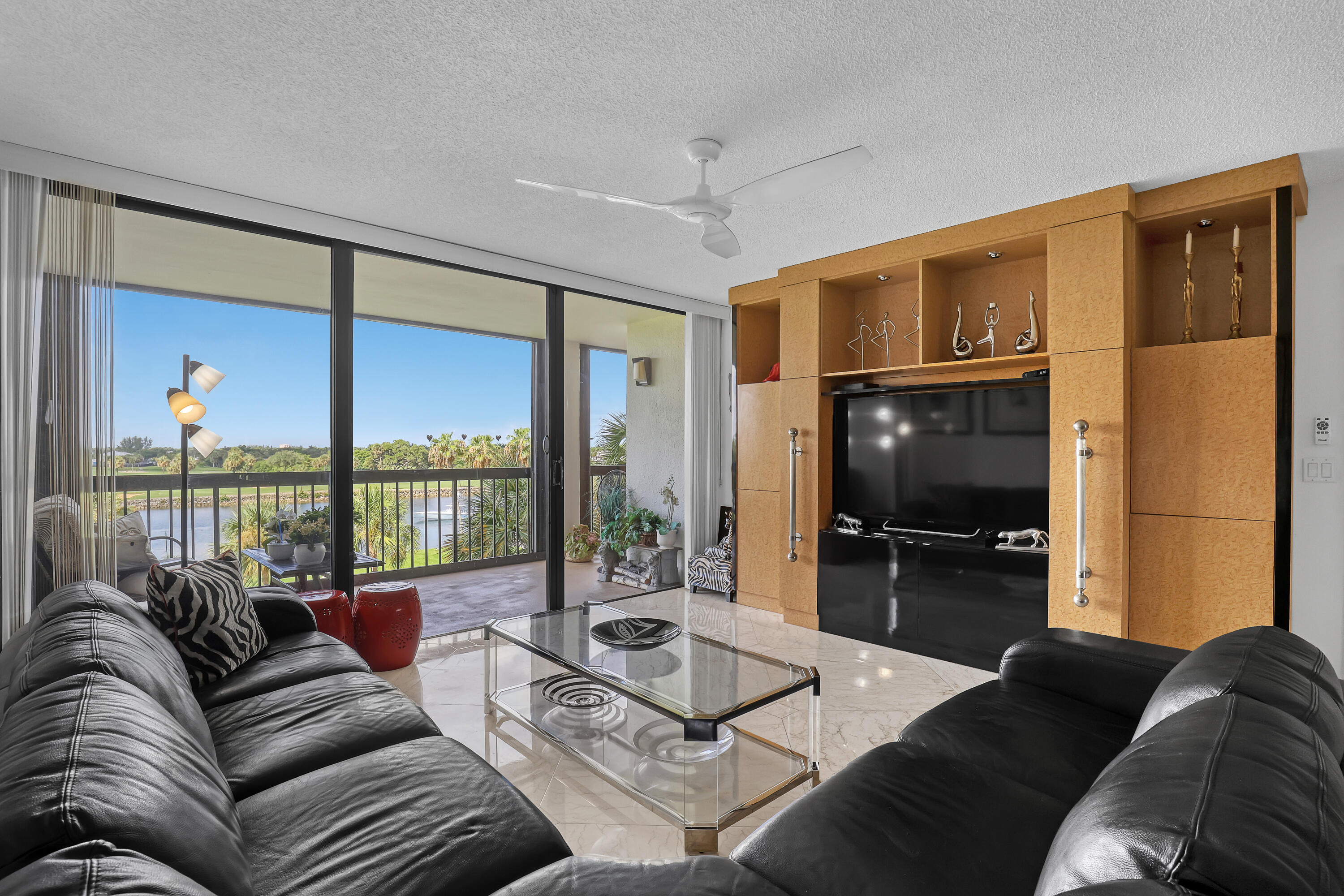 356 Golfview Road, Unit 403 North Palm Beach, FL 33408 - Photo 12 of 25 Living Room — Floor-to-Ceiling Views
