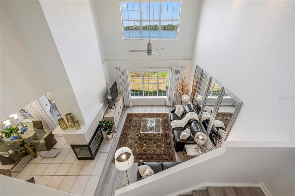 7420 Cypress Grove Road, Unit 132 Orlando, FL 32819 - Photo 21 of 52 a view of an entryway with wooden floor