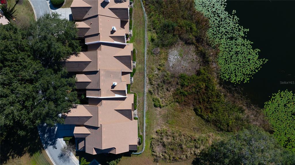 7420 Cypress Grove Road, Unit 132 Orlando, FL 32819 - Photo 35 of 52 an aerial view of a house with outdoor space