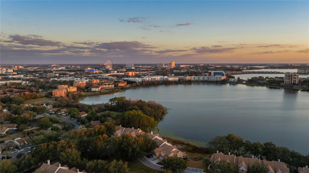 7420 Cypress Grove Road, Unit 132 Orlando, FL 32819 - Photo 37 of 52 an aerial view of city and lake