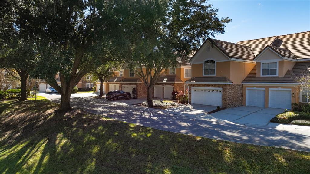 7420 Cypress Grove Road, Unit 132 Orlando, FL 32819 - Photo 38 of 52 a view of house with outdoor space