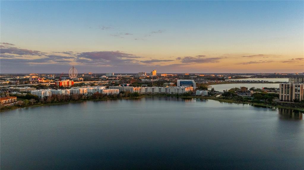 7420 Cypress Grove Road, Unit 132 Orlando, FL 32819 - Photo 42 of 52 an aerial view of ocean and residential houses with outdoor space