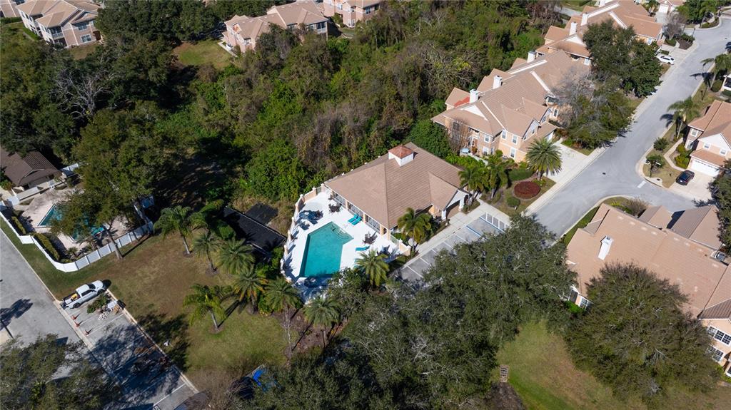7420 Cypress Grove Road, Unit 132 Orlando, FL 32819 - Photo 45 of 52 an aerial view of a house with a yard