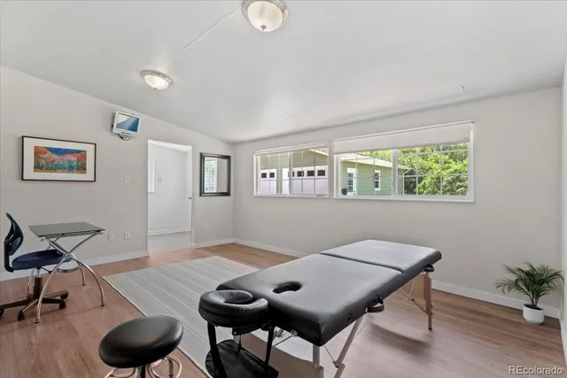 a workspace with furniture and window