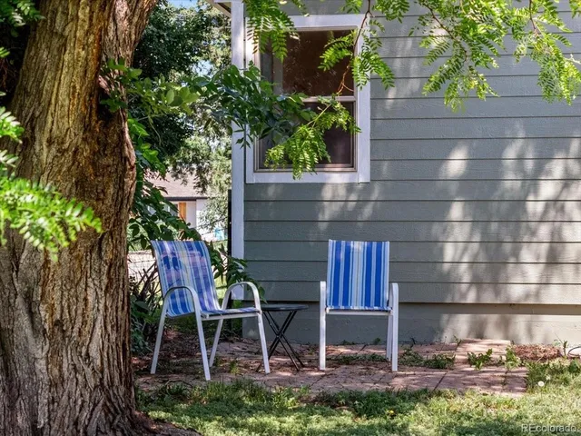 a house view with a garden space