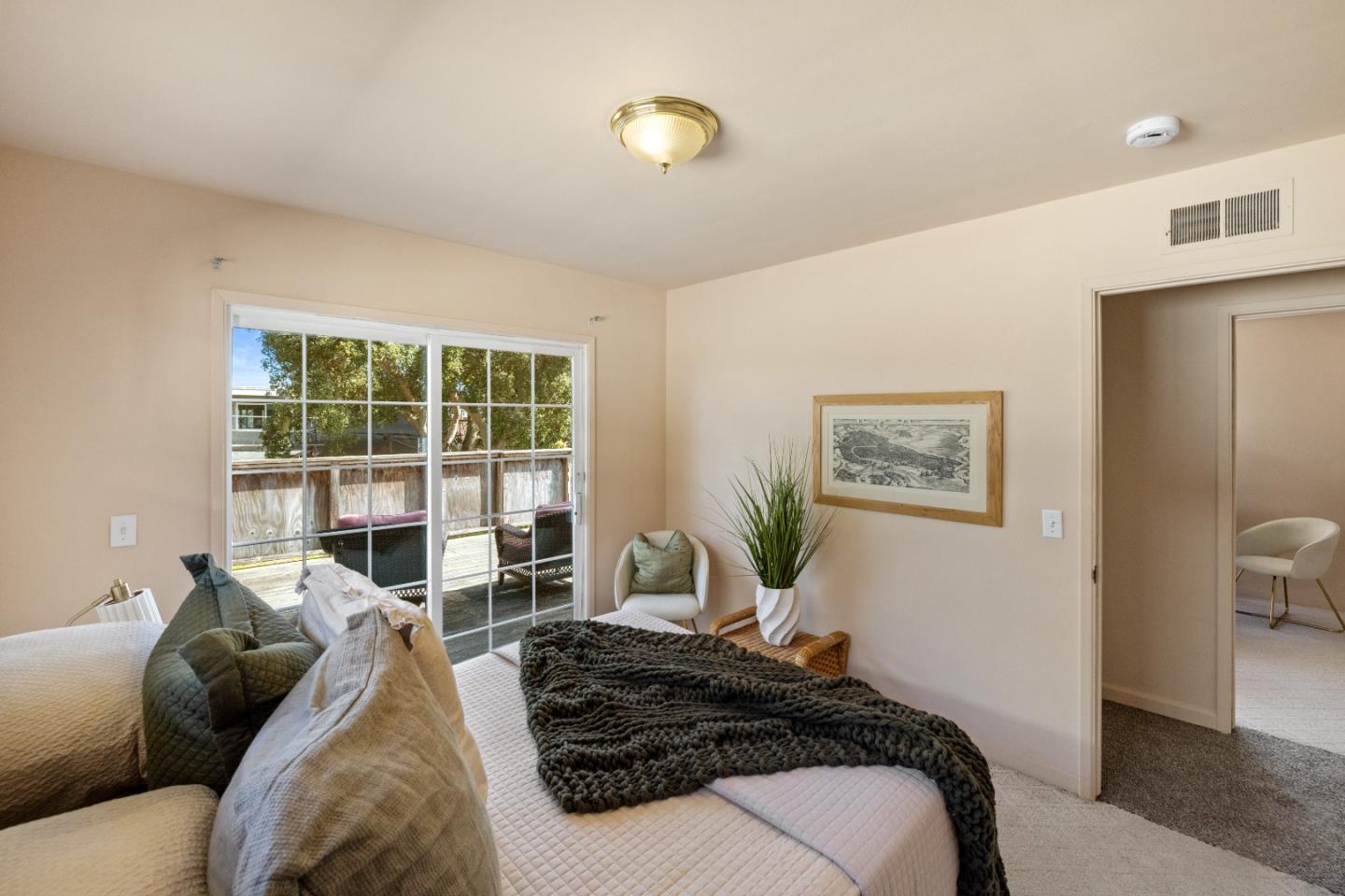 662 Oak Street Monterey, CA 93940 - Photo 13 of 32 a bed room with a bed and a window