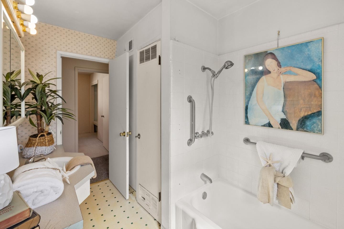 662 Oak Street Monterey, CA 93940 - Photo 15 of 32 a bathroom with a granite countertop sink a toilet and shower