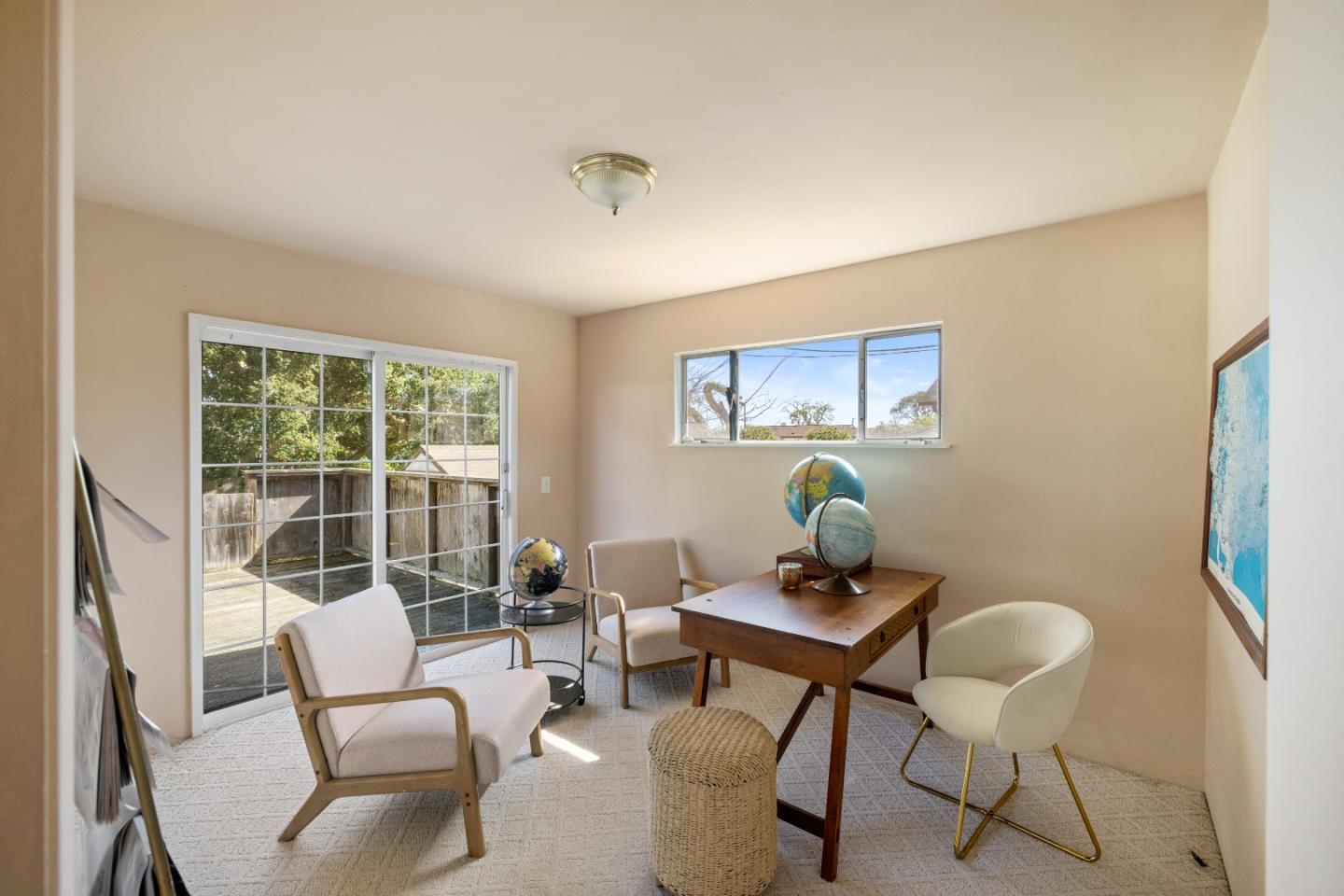 662 Oak Street Monterey, CA 93940 - Photo 18 of 32 a living room with furniture and a window