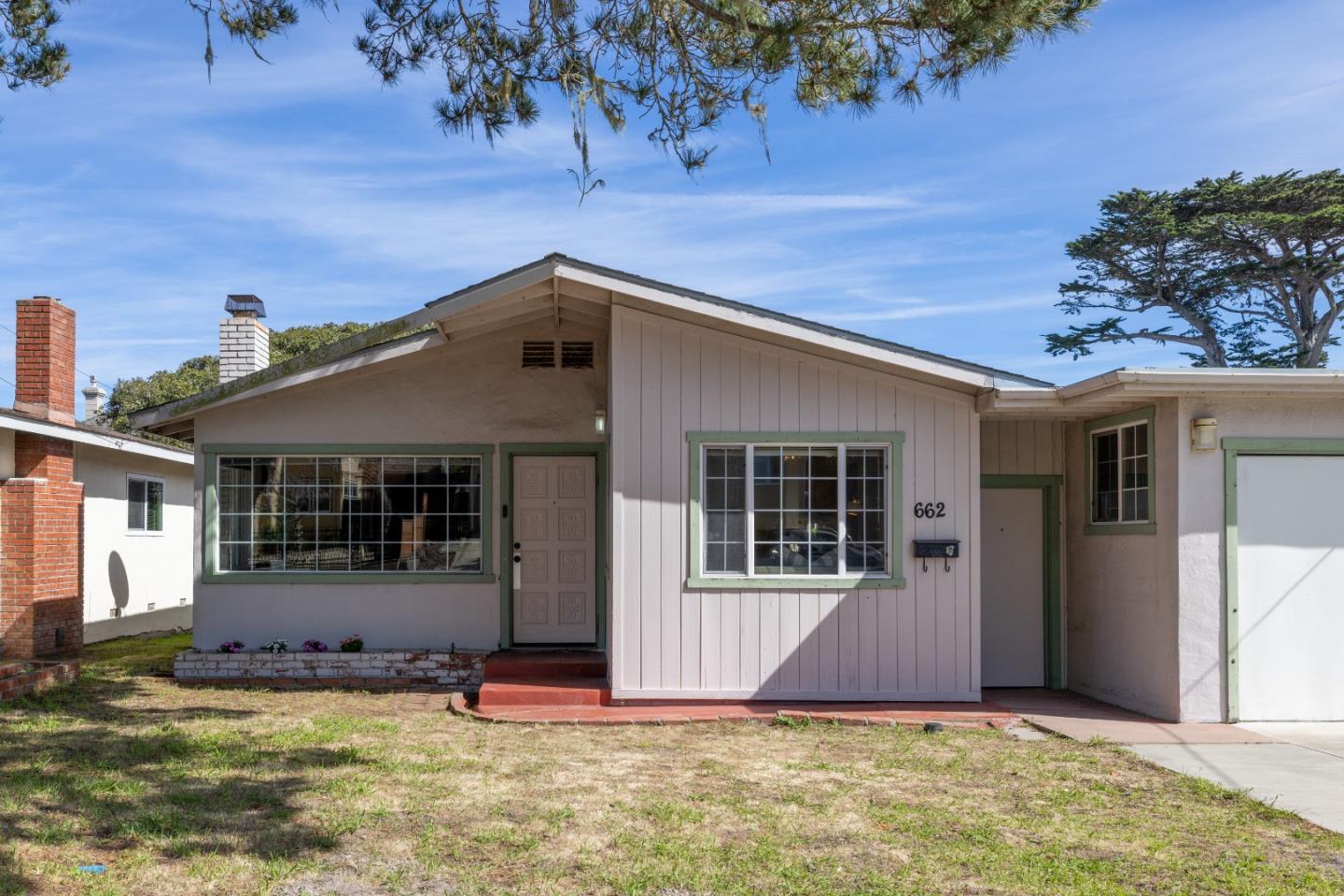 662 Oak Street Monterey, CA 93940 - Photo 2 of 32 front view of a house with a yard