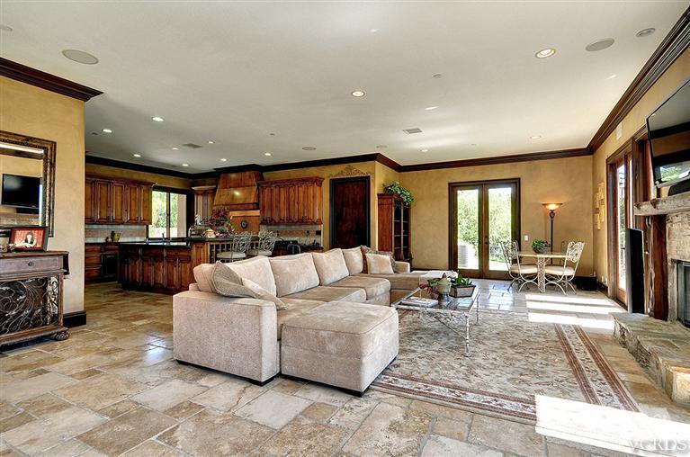 969 North Rancho Road Thousand Oaks, CA 91362 - Photo 8 of 30 a living room with furniture and a large window