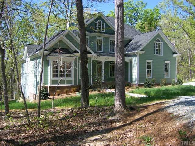 135 Rastille Lane Durham, NC 27712 - Photo 1 of 10 a front view of a house with a yard