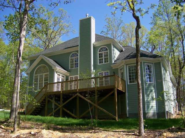 135 Rastille Lane Durham, NC 27712 - Photo 2 of 10 a view of a house with a yard