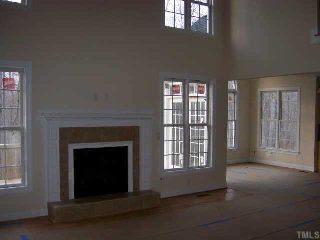 135 Rastille Lane Durham, NC 27712 - Photo 10 of 10 a living room with furniture and a fireplace