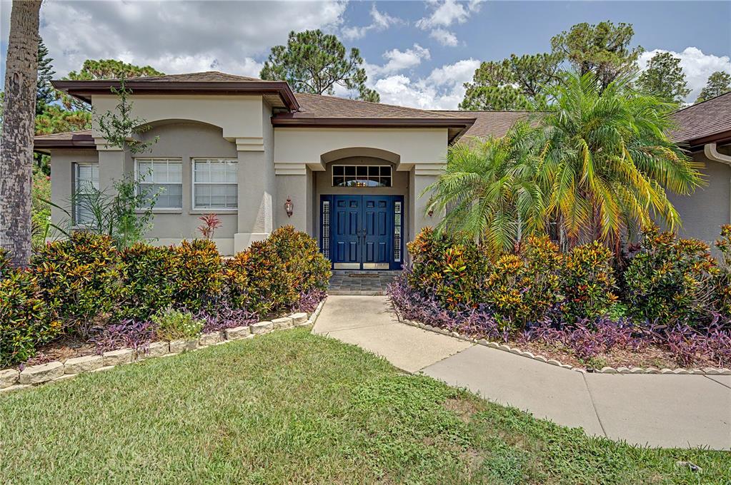 7201 Forestedge Court New Port Richey, FL 34655 - Photo 2 of 37