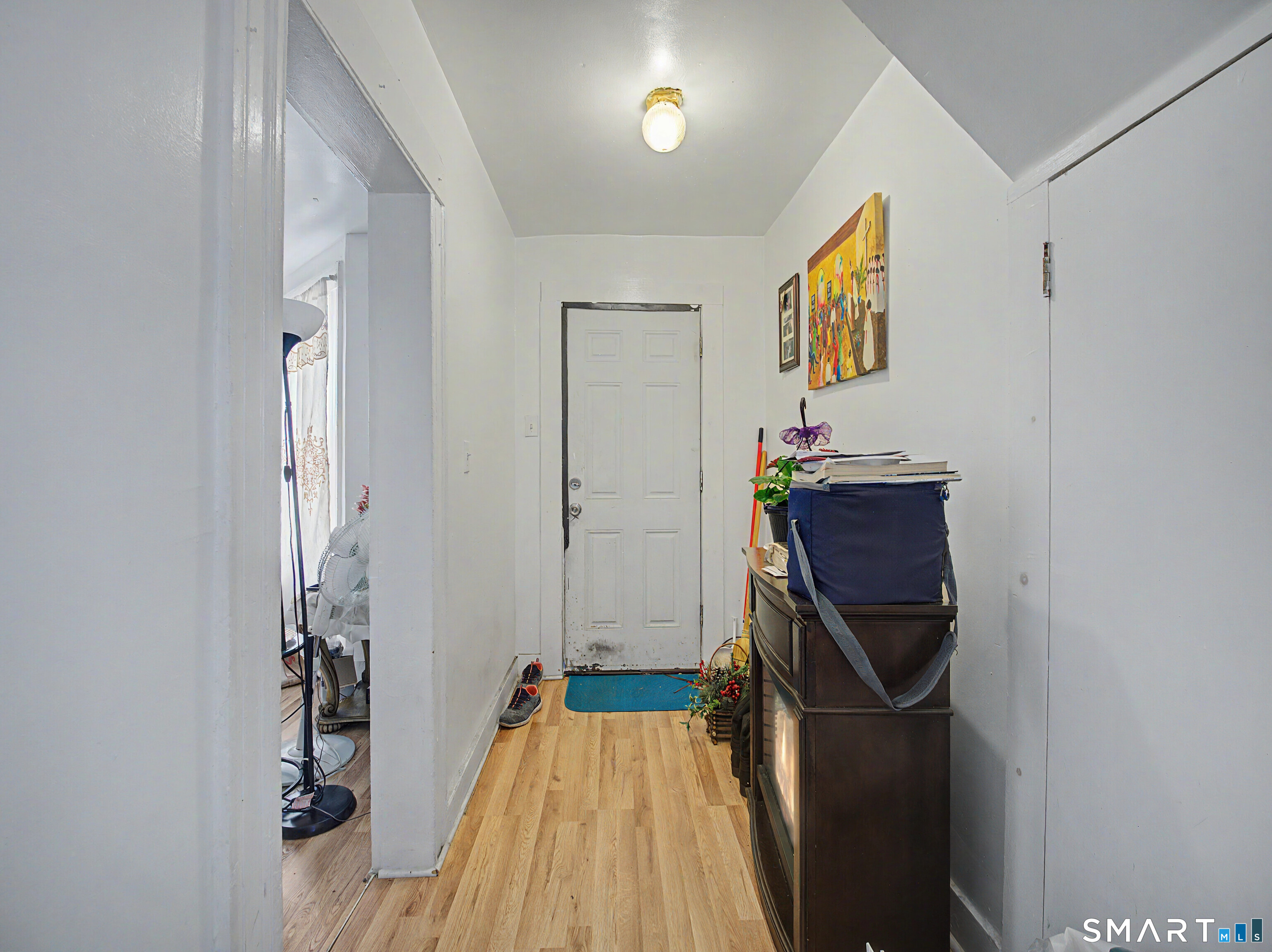 319 Carroll Avenue Bridgeport, CT 06607 - Photo 9 of 40 a view of hallway with wooden floor