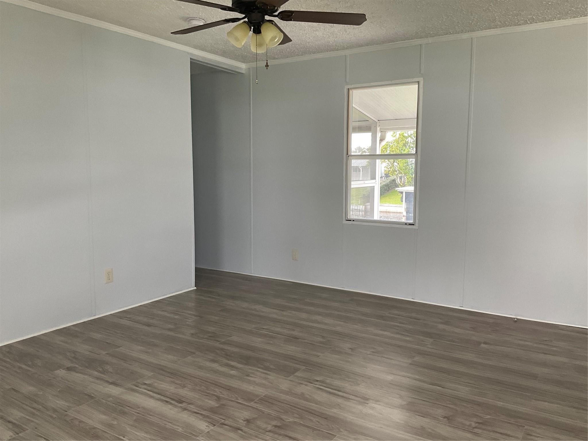 2521 Southeast 33rd Street Okeechobee, FL 34974 - Photo 23 of 26 ceiling fan in living room