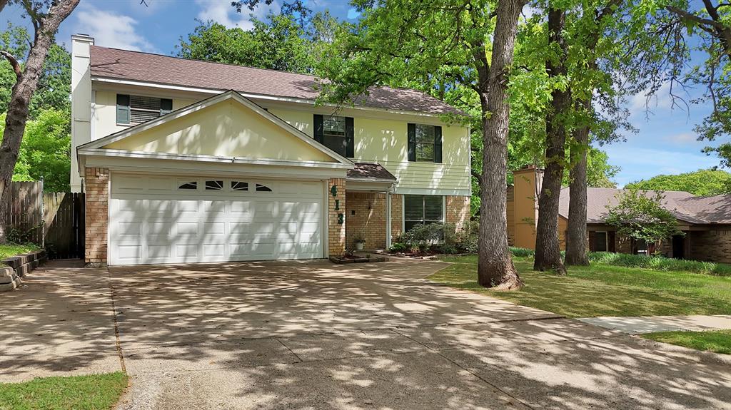 413 Wild Oak Lane Euless, TX 76039 - Photo 2 of 29 a view of a house with a yard