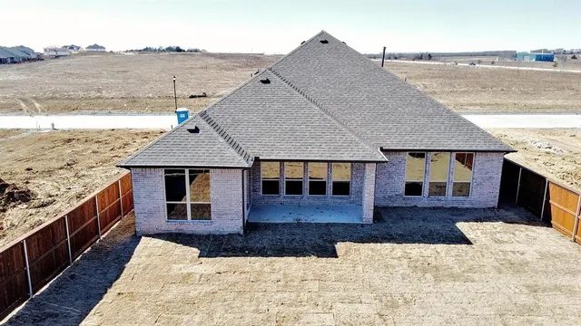 a front view of house with yard
