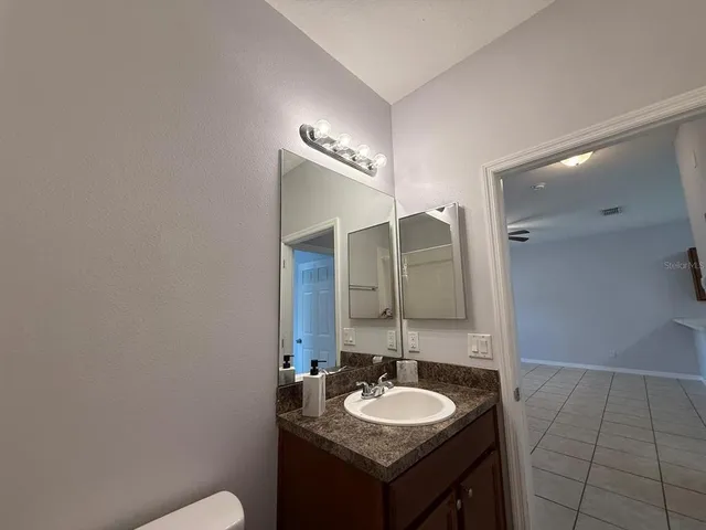 a view of a backyard with garden