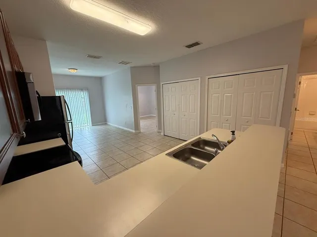 a bedroom with a bed and a walk in closet