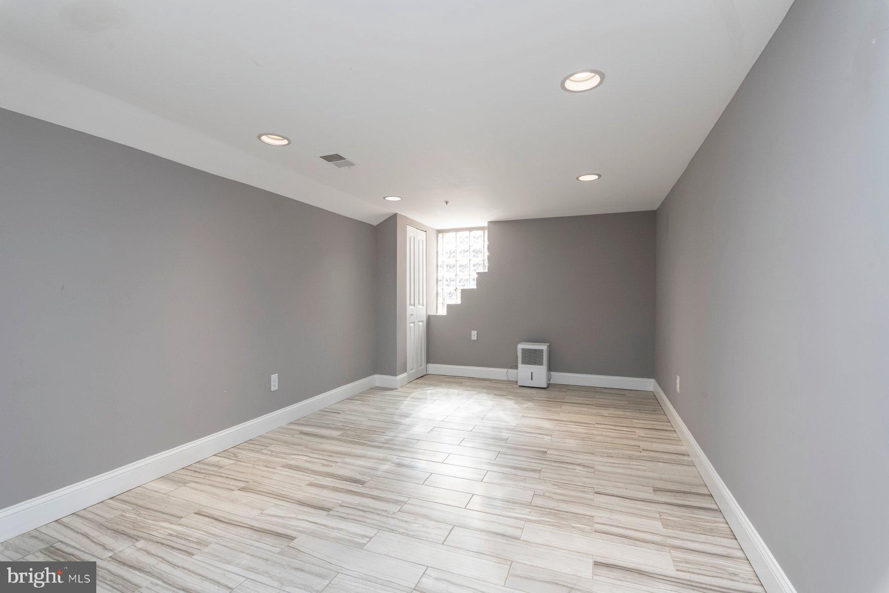 1237 William Street Baltimore, MD 21230 - Photo 24 of 34 a view of an empty room with wooden floor