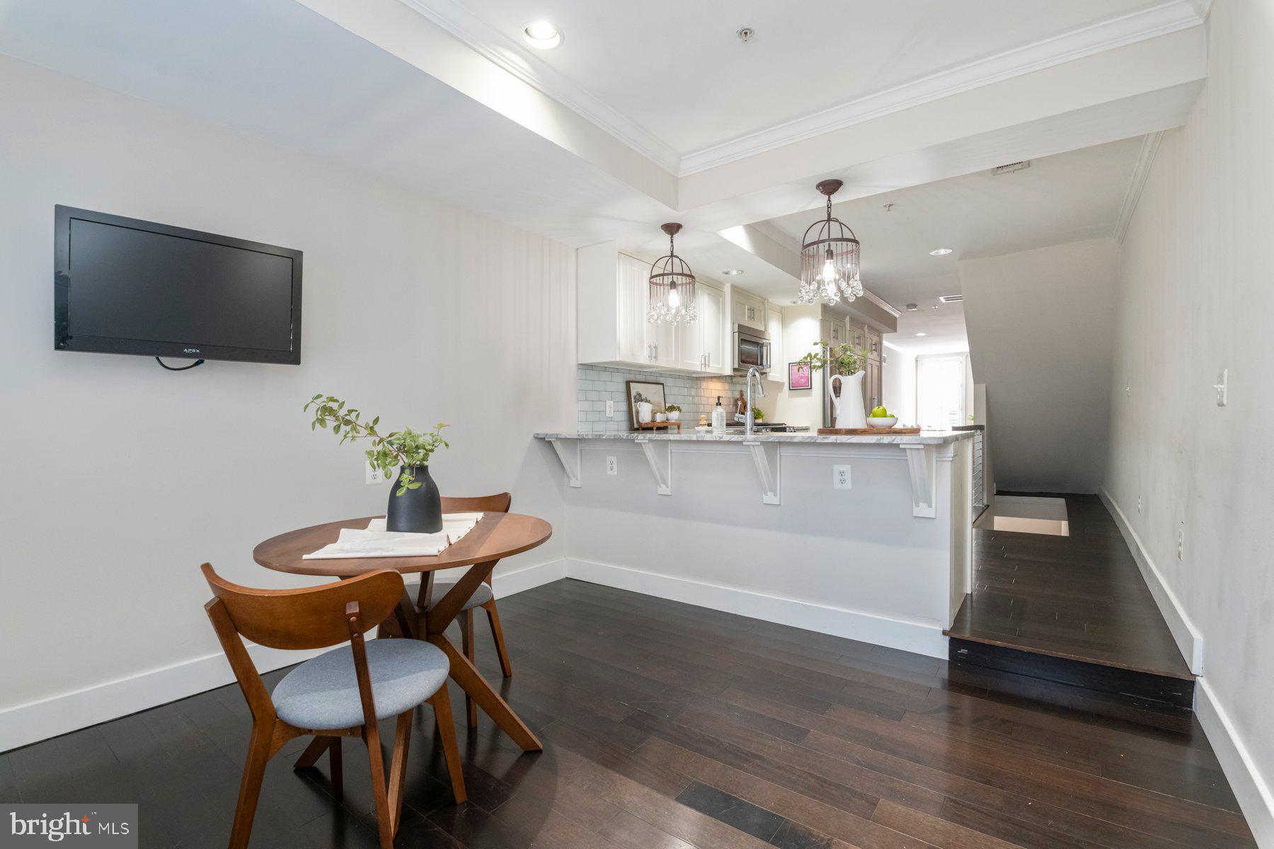 1237 William Street Baltimore, MD 21230 - Photo 6 of 34 a view of a dining room with furniture and wooden floor