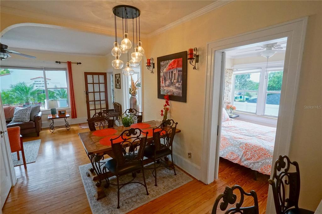 229 East 6th Avenue Mount Dora, FL 32757 - Photo 12 of 65 a view of a dining room with furniture window and outside view